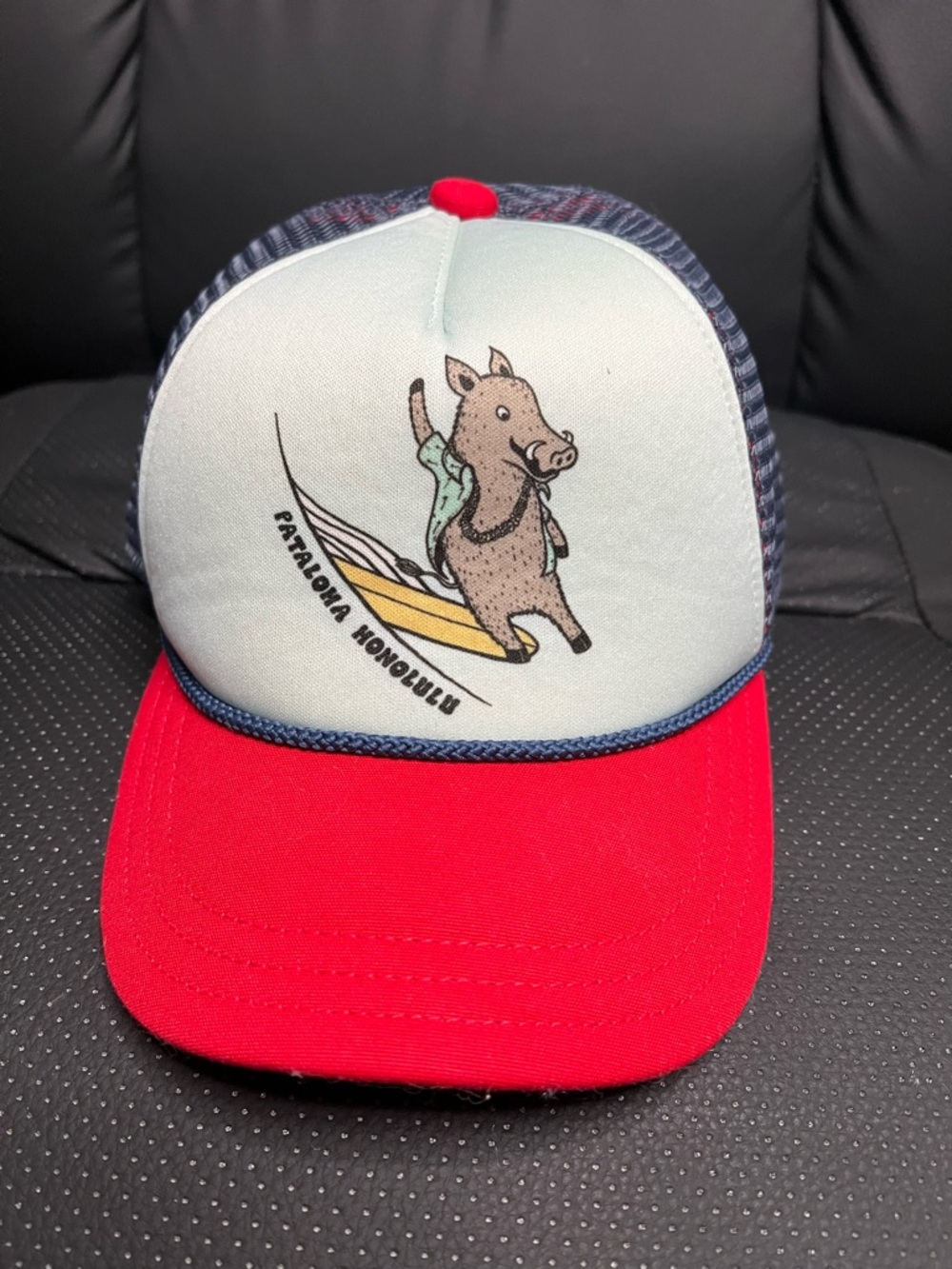 Patagonia..Red-Brim Trucker Hat with Surfing Boar Graphic